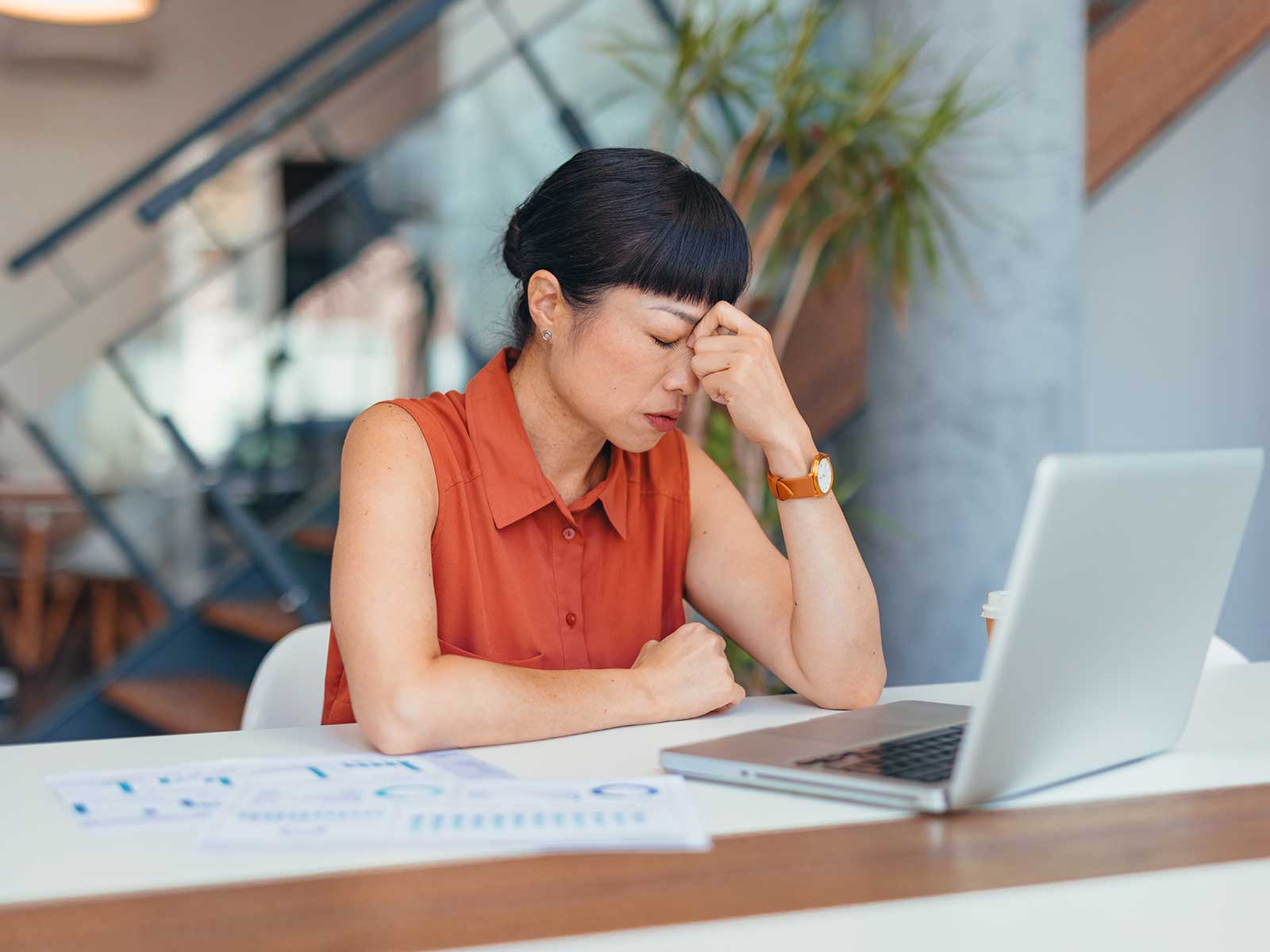 Woman experience a sign of employee burnout