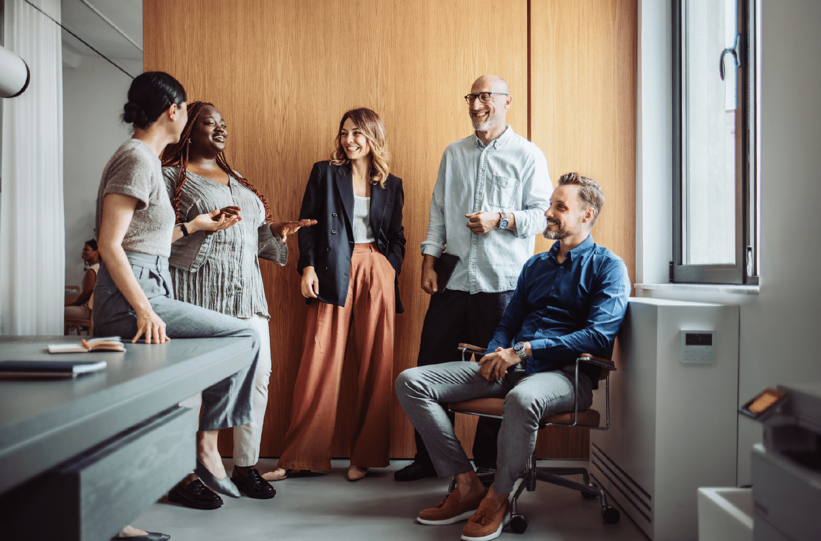 Employees at a company with an award winning culture that uses TINYpulse by WebMD Health Services