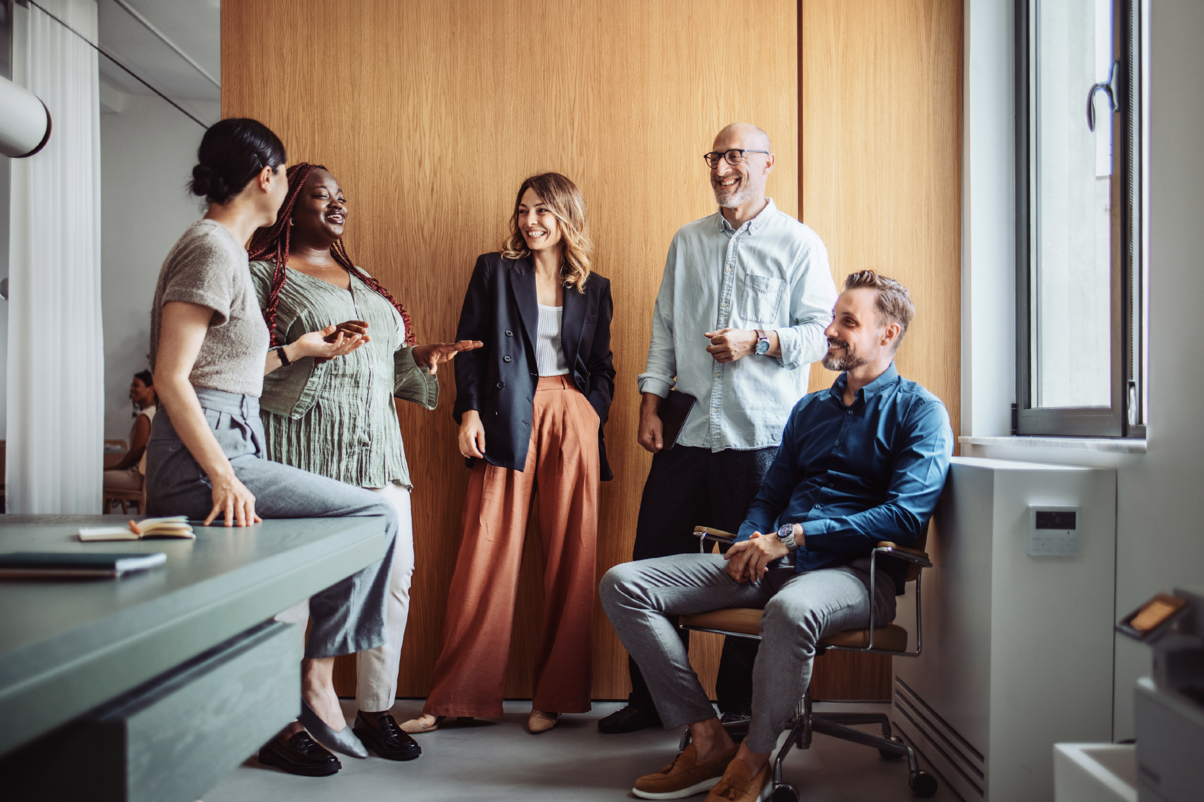Employees at a company with an award winning culture that uses TINYpulse by WebMD Health Services